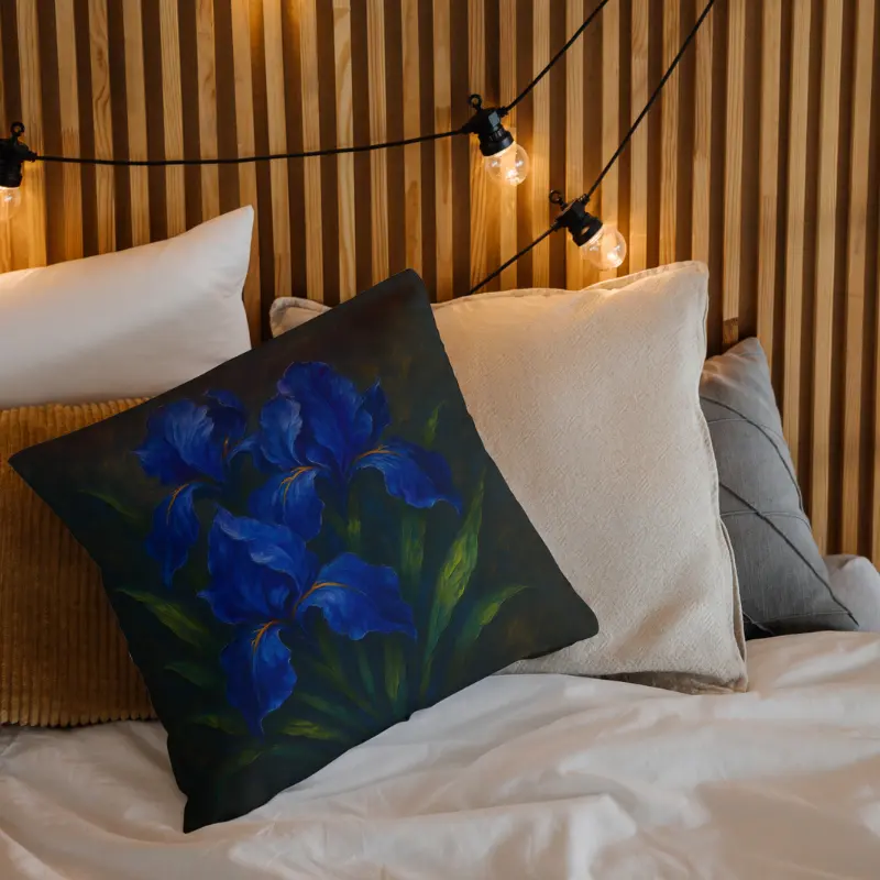 Cobalt iris impasto throw pillow on neutral bed with luminous indigo petals and soft halo