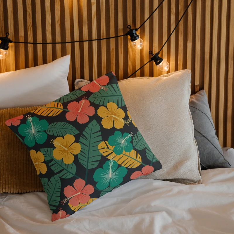 Bold tropical pillow on outdoor daybed with coastal styling